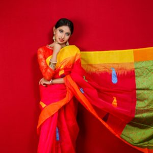 woman in yellow and red sari dress